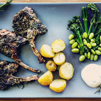 Herb crusted halal lamb chops with broccoli and edamame beans