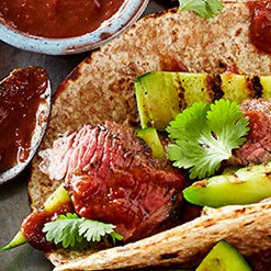 Spicy halal steak rotis with tamarind and griddled cucumber